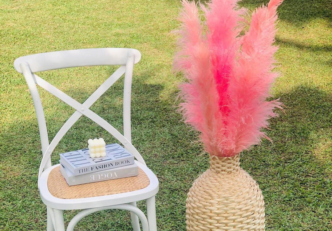 Pink pampas grass with a bamboo style vase decor